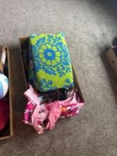 Towels, sunglasses, volleyball, rotating Christmas tree stand, office supplies, etc