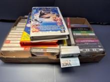 Assorted Cassette Tapes and 2- VHS tapes