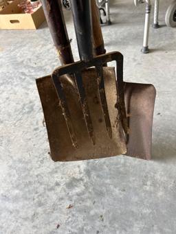 Potato fork and two flat sand shovels.