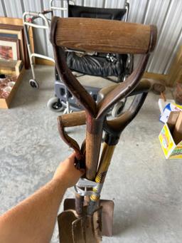 Potato fork and two flat sand shovels.