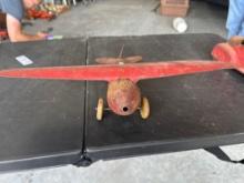 1930's Wyandotte pressed steel toy airplane, wood wheels, 10'' wingspan. Shipping