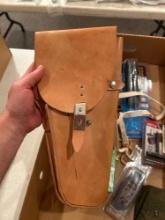 Box of assorted gun parts, leather sporting pouches, brass knuckles, Thunder Cloud ram rod