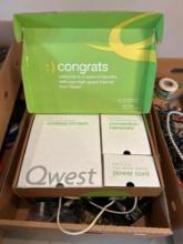 Qwest wifi router, assorted electric cords