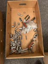 Box of assorted sockets and tools