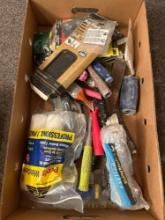 Box of assorted painting and taping accessories