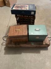 Leather bag, vintage ammunition box, magazine rack on wheels