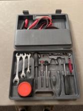 Small tool kit, jumper cables, wrenches, screw drivers, electrical supplies