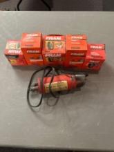 Assorted oil filters, engine water heater, carry basket