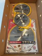 Box of assorted brand new saw blades, various sizes