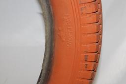 Early Fisk Tire Display Stand with Original Fisk Red Air Flight Tire