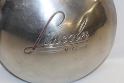 Group of 2 1934-1942 Lincoln V12 Hubcaps