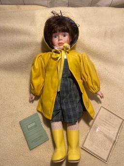 Porcelain Doll in Yellow Rain Gear