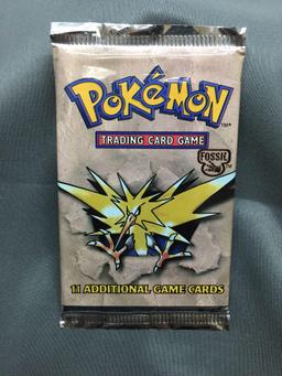 Factory Sealed Pokemon Fossil Unlimited 11 Card Booster Pack - 20.8 Grams