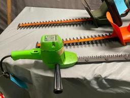 3- Electric hedge trimmers, all work when plugged in