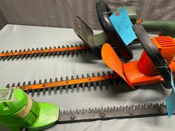3- Electric hedge trimmers, all work when plugged in