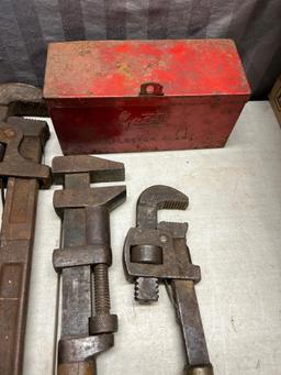 3- Pipe wrenches and reflector set, largest wrench is 24 inches