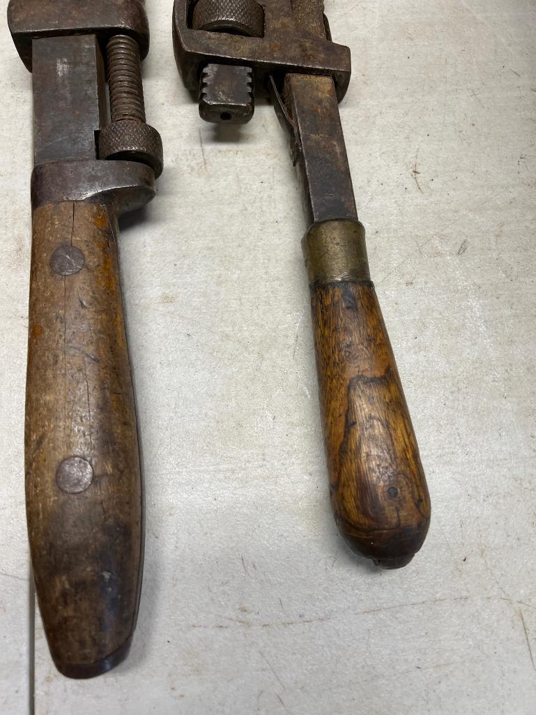 3- Pipe wrenches and reflector set, largest wrench is 24 inches