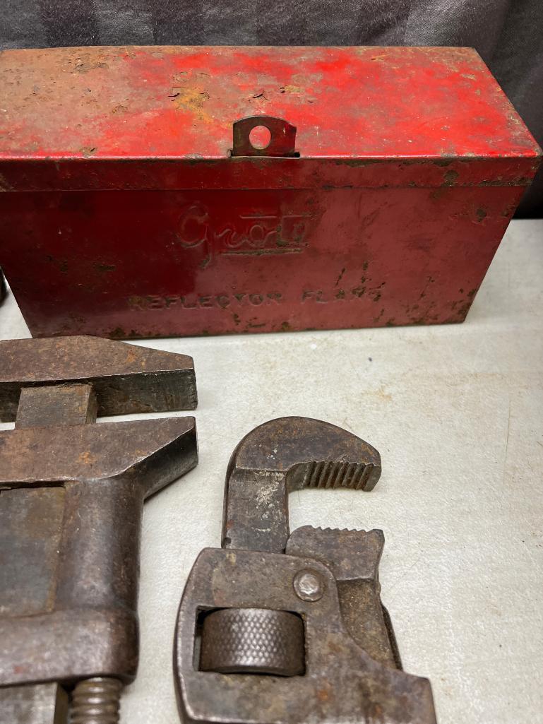 3- Pipe wrenches and reflector set, largest wrench is 24 inches