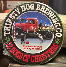 (1) Fireball Whisky and (1) Thirsty Dog Brewing Pressed Tin Signs