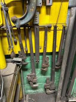 Wall of Pipe Cutters, Pipe Wrenches, and Bolt Cutters