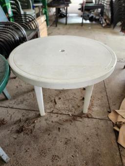 (5) Round Plastic Patio Tables (located off-site, please read description)