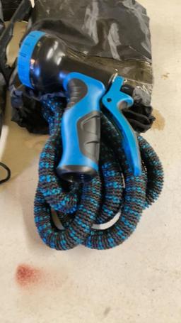 Lot of 2 collapsible water hoses w/ nozzles