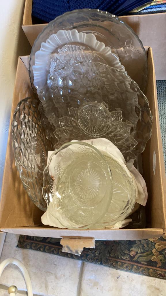Box of glass bowls, trays, cake server top