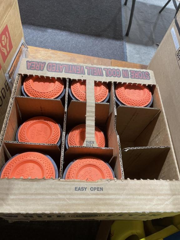 Partial box of clay pigeons
