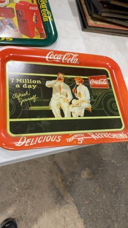 4 metal Coca-Cola serving trays