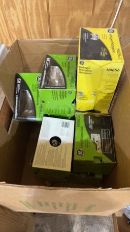 Box of 3 prong halogen headlights