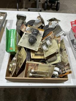 Box of misc roller casters,caster cups & door