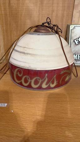 Coors light fixture & Foster’s Lager sign
