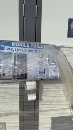 Unused Bastone portable toilet