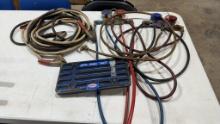 2 Freon gauges, jumper cables & license plate