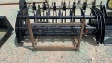 Skid steer curved log grabber
