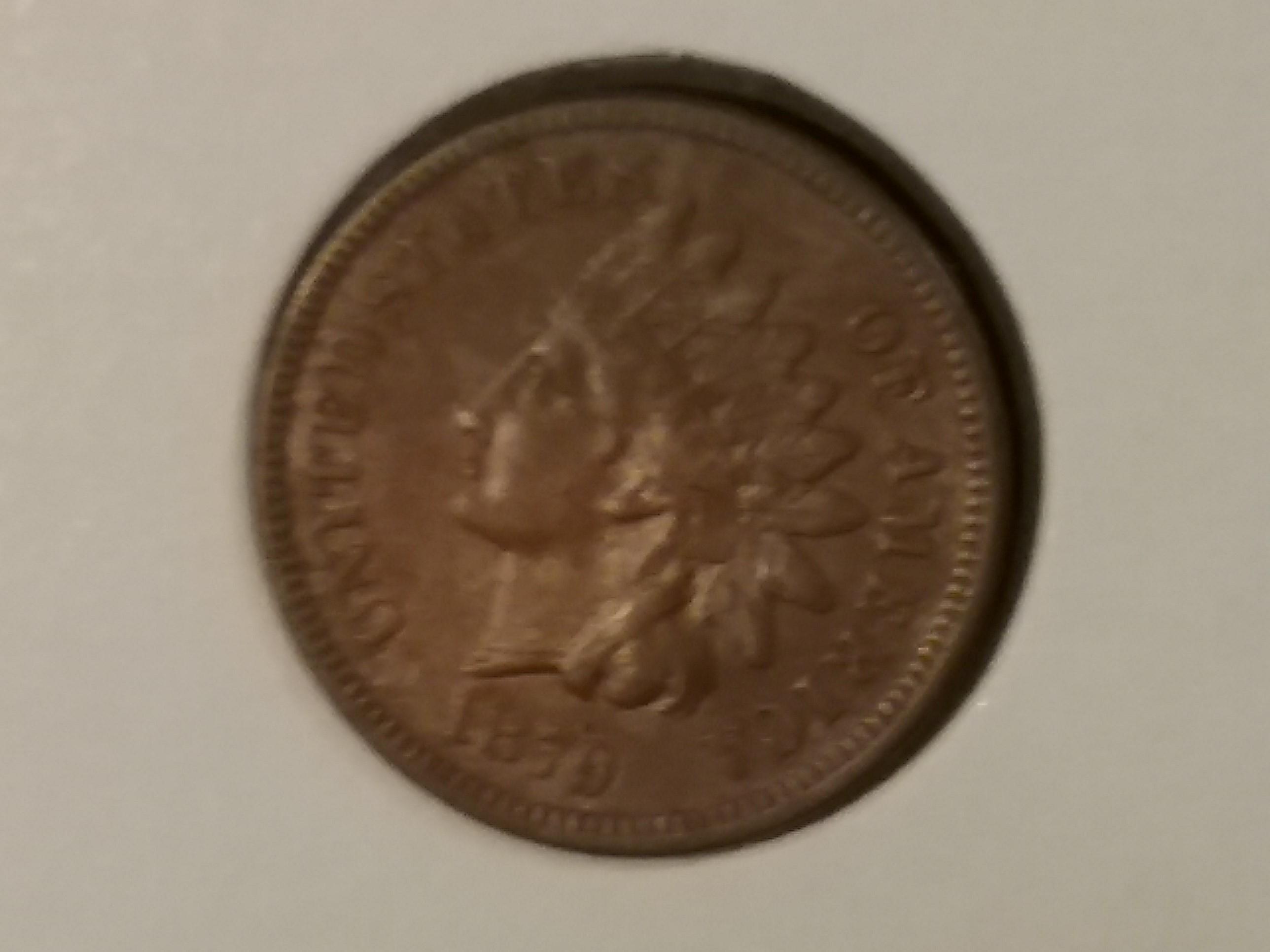 An absolutely gorgeous 1879 Indian Cent in About Uncirculated red-brown condition
