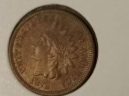 An absolutely gorgeous 1879 Indian Cent in About Uncirculated red-brown condition