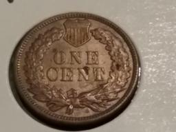 An absolutely gorgeous 1879 Indian Cent in About Uncirculated red-brown condition