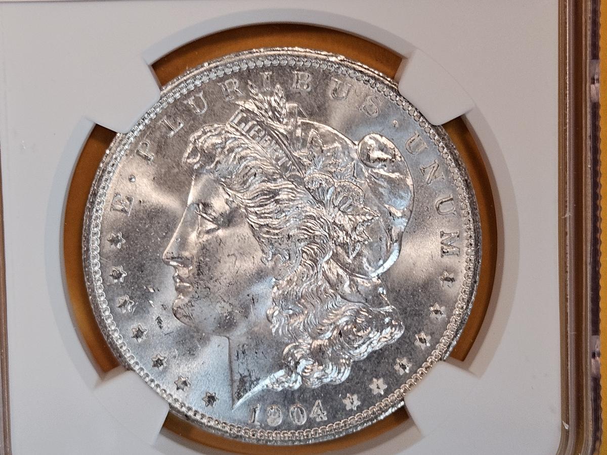 NGC 1904-O Morgan Dollar in Mint State 64