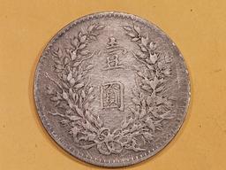 Chinese silver Fat Man Dollar