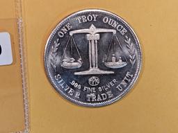 One Troy ounce .999 fine Silver proof art round