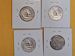 Four mixed silver quarters