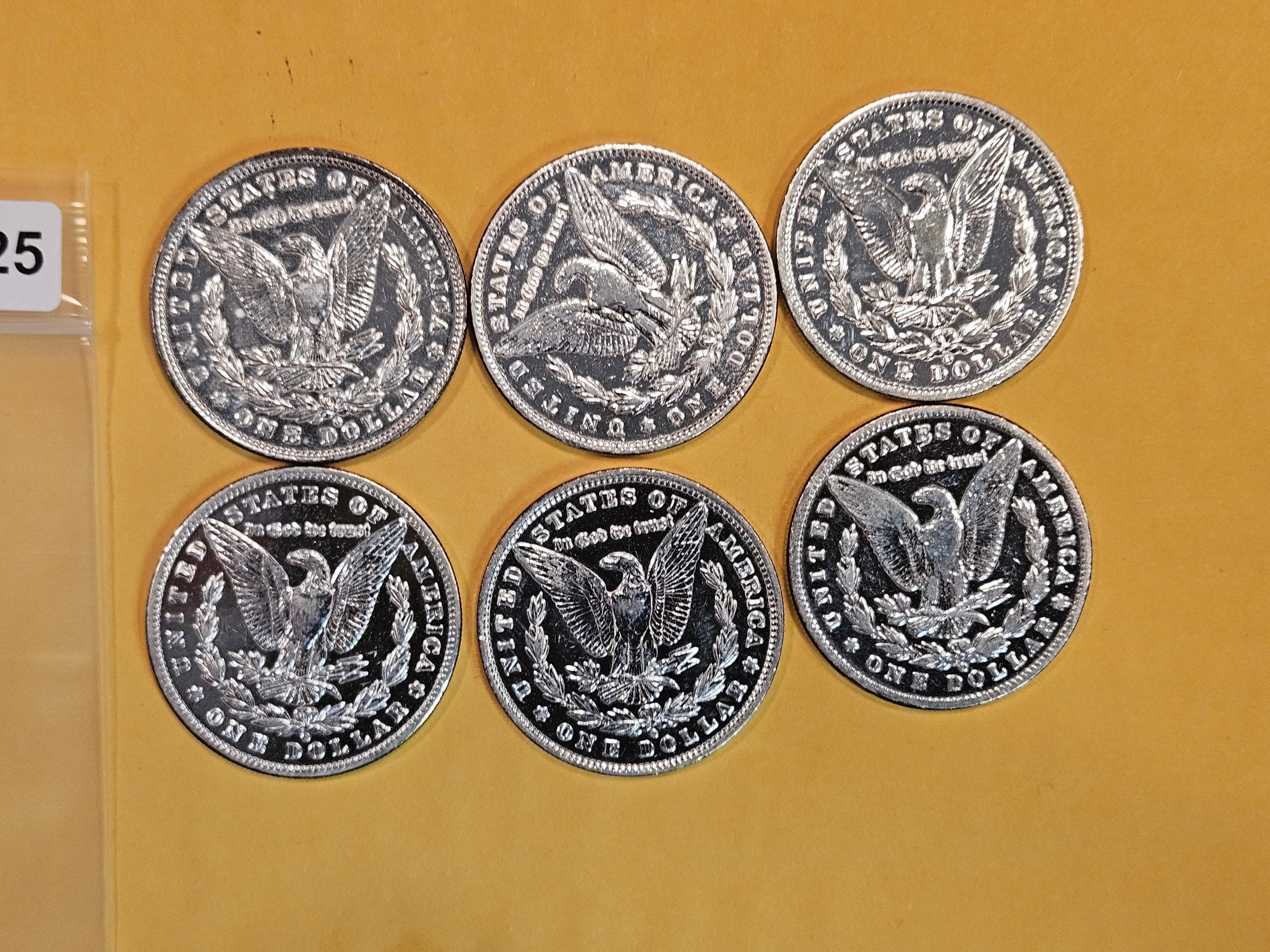 Six Morgan Silver Dollars