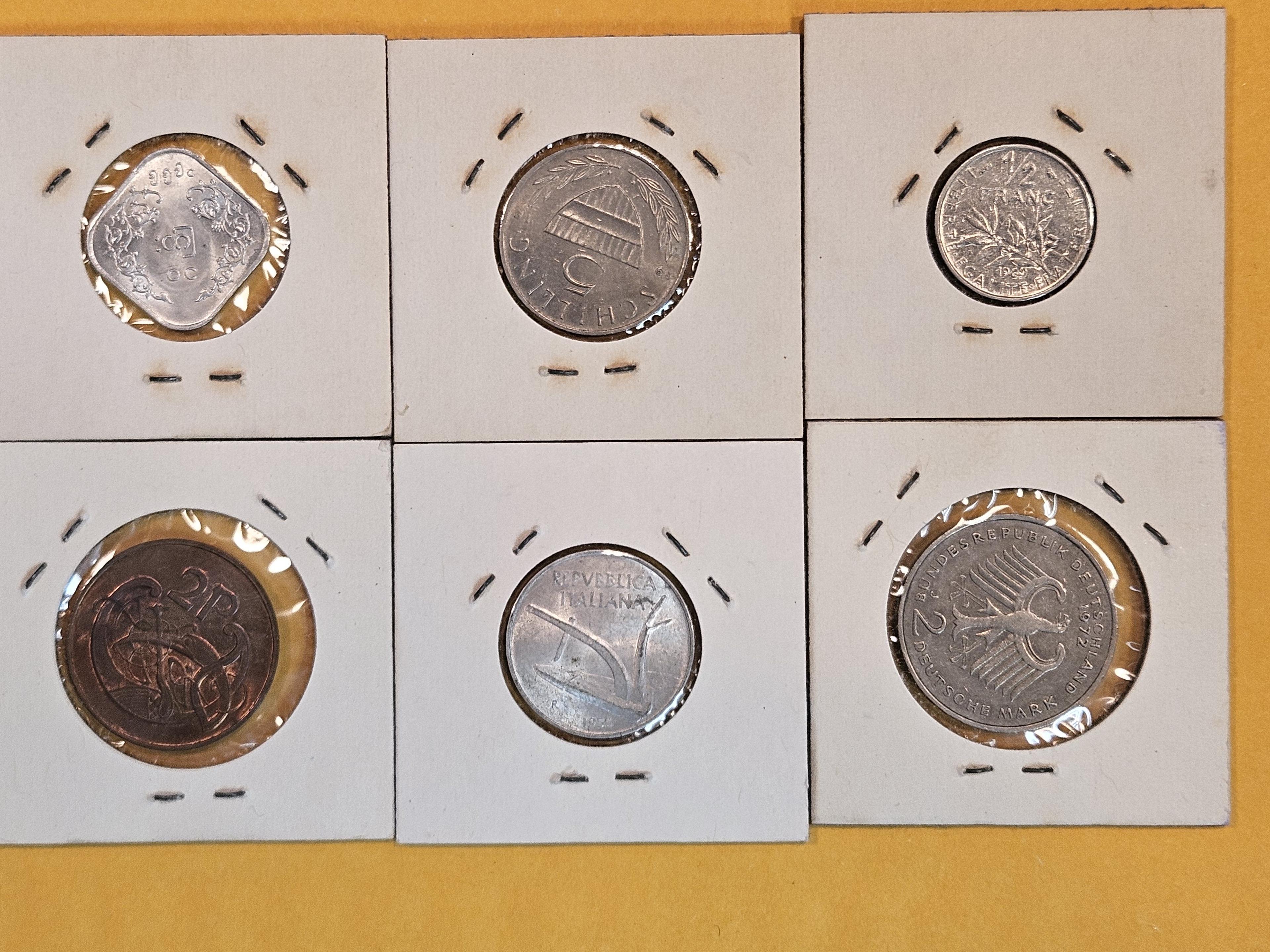 Six mixed World Coins