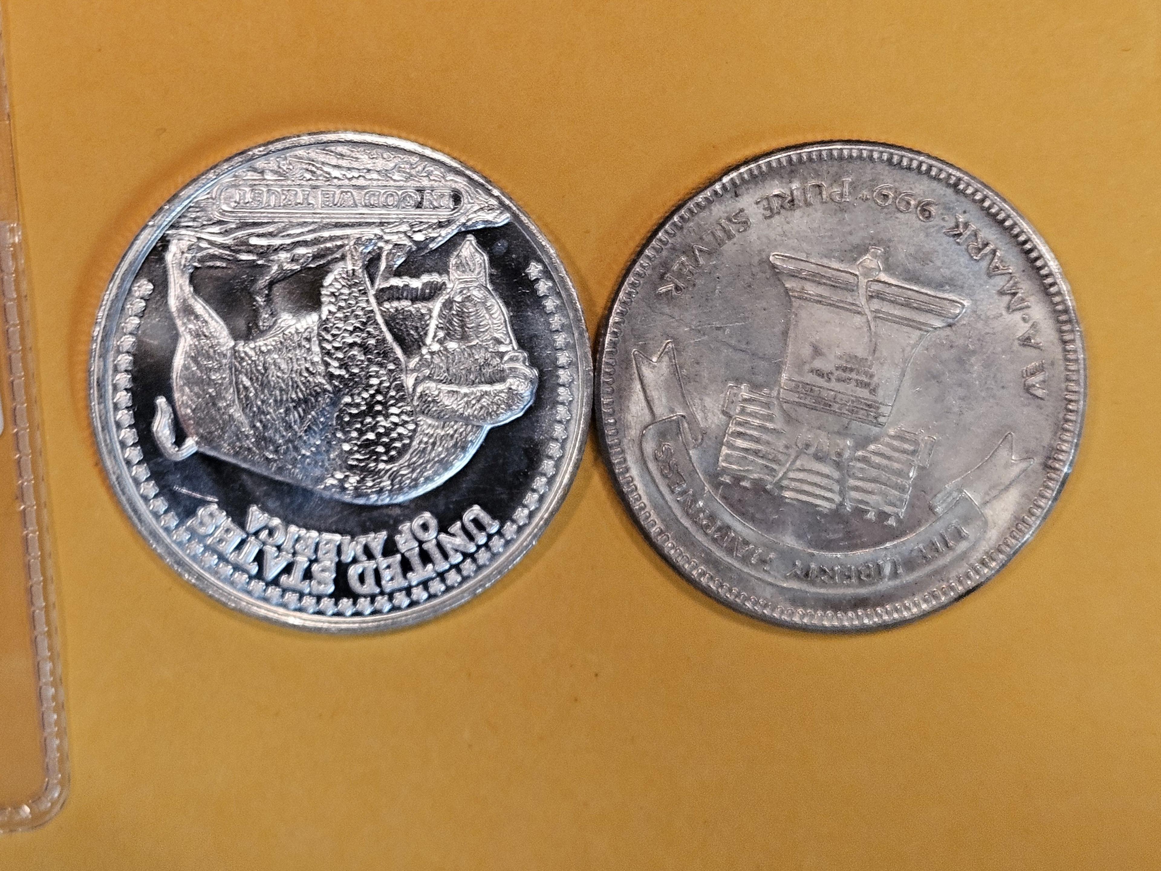 Two 1 Troy ounce .999 fine silver art rounds