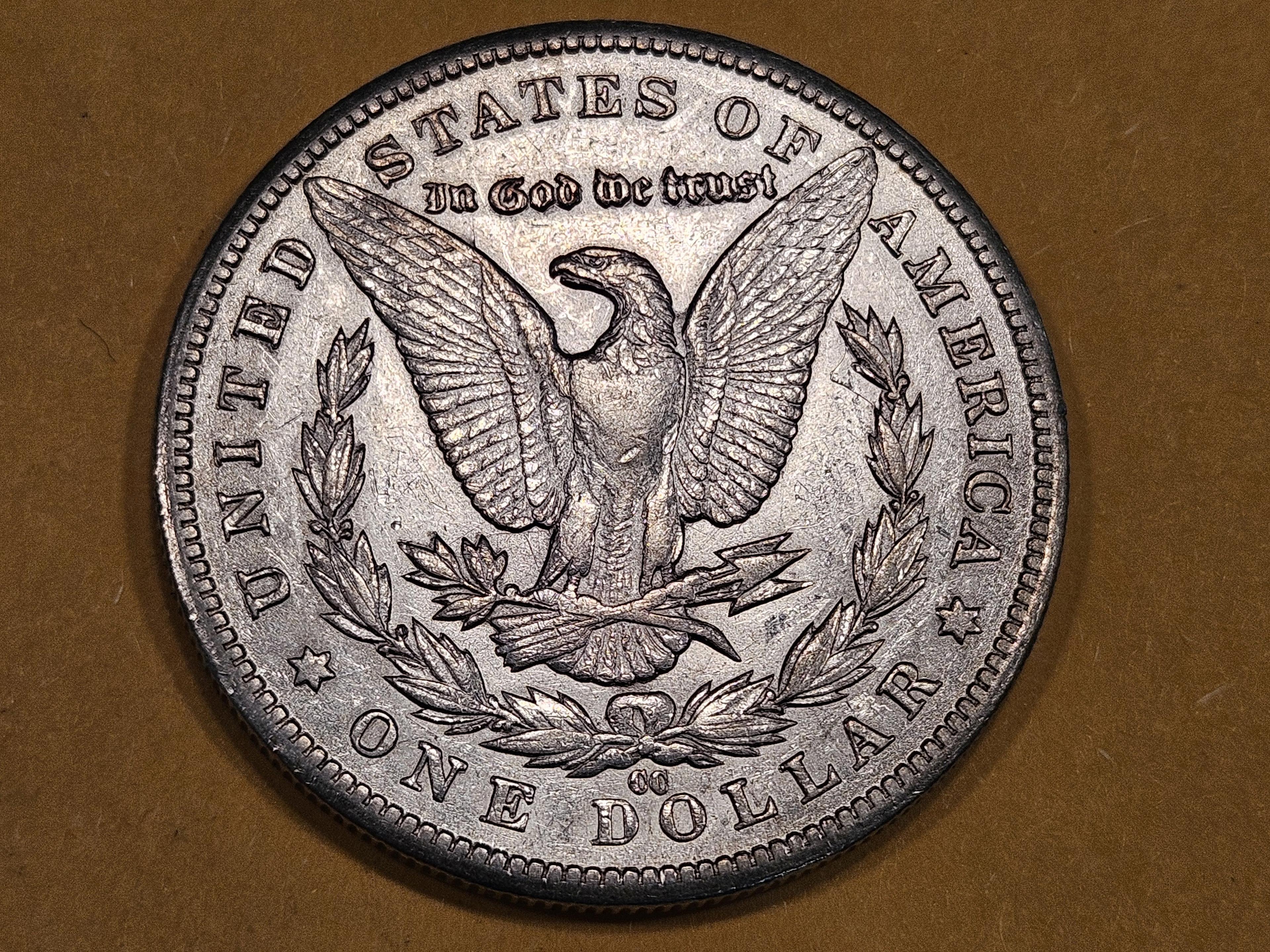 ** KEY DATE ** 1883-CC Morgan Dollar in Brilliant About uncirculated plus