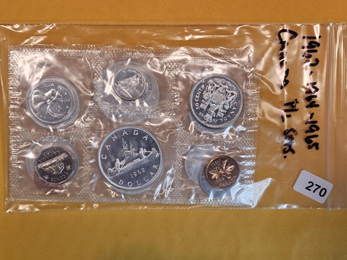 Three Canadian Coin sets in original packaging