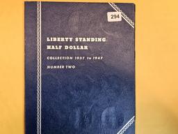 Partially complete Walking Liberty Half Dollar album