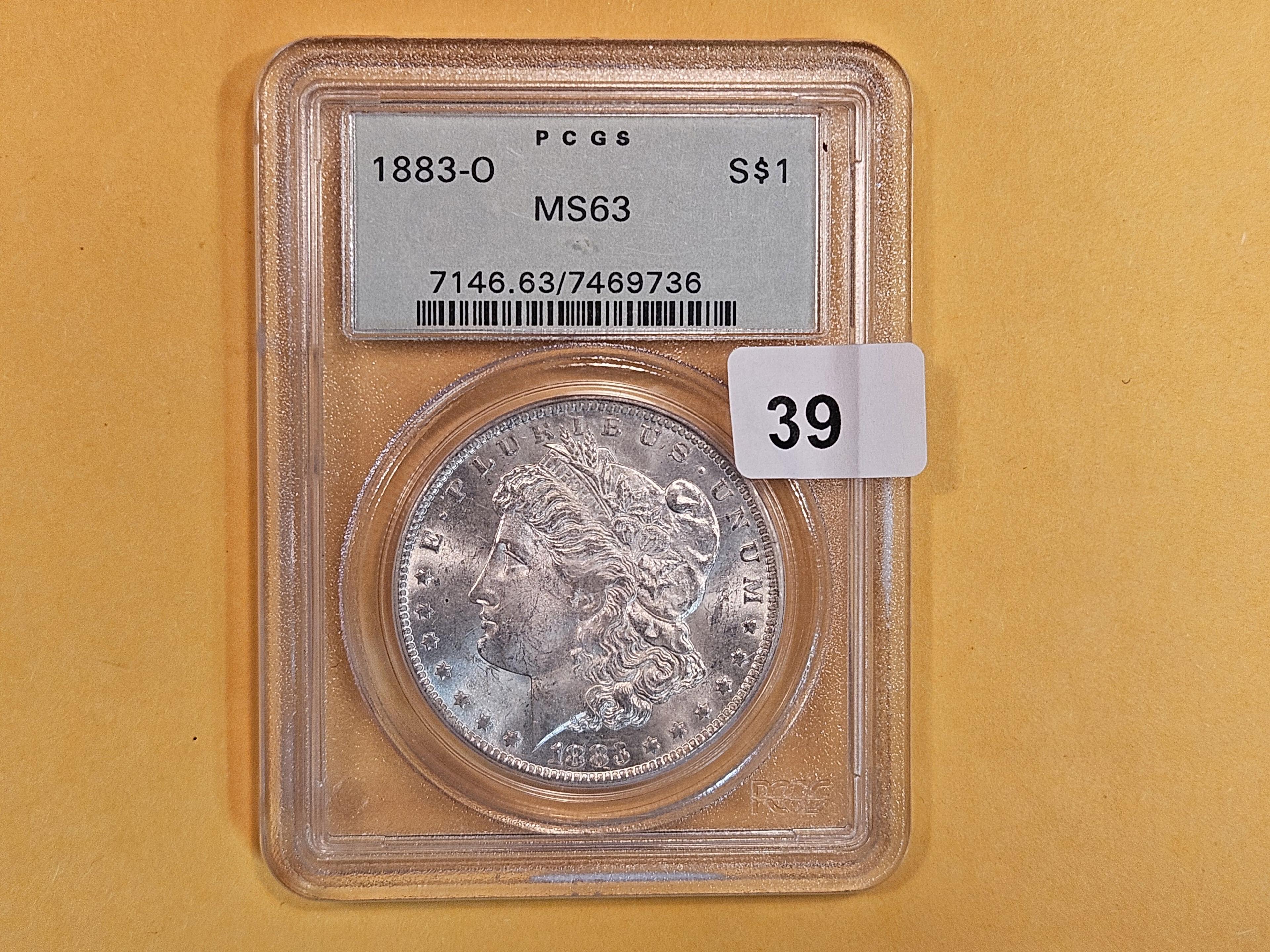 OGH! PCGS 1883-O Morgan Dollar in Mint State 63