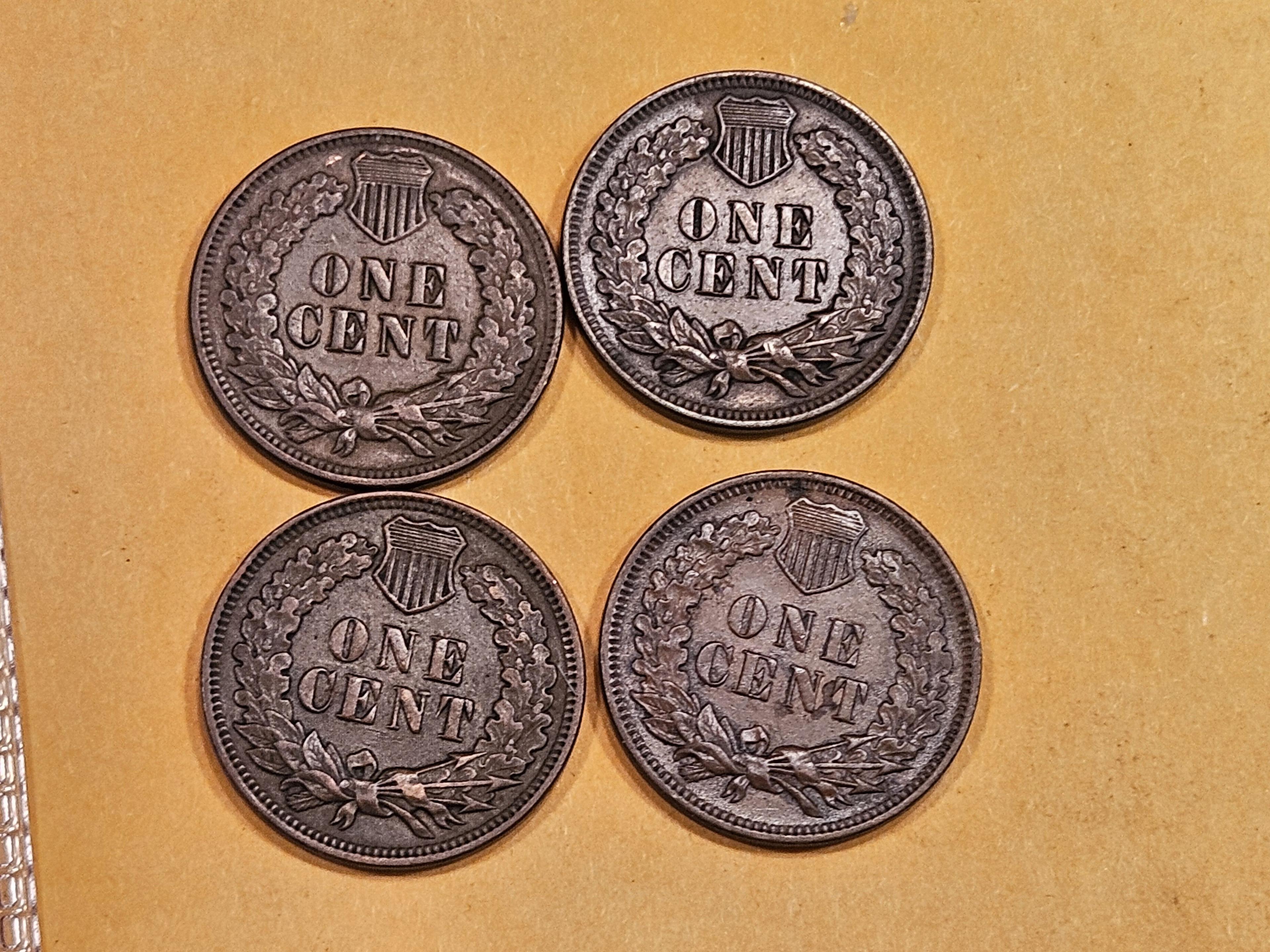 Four About Uncirculated Plus Indian Cents